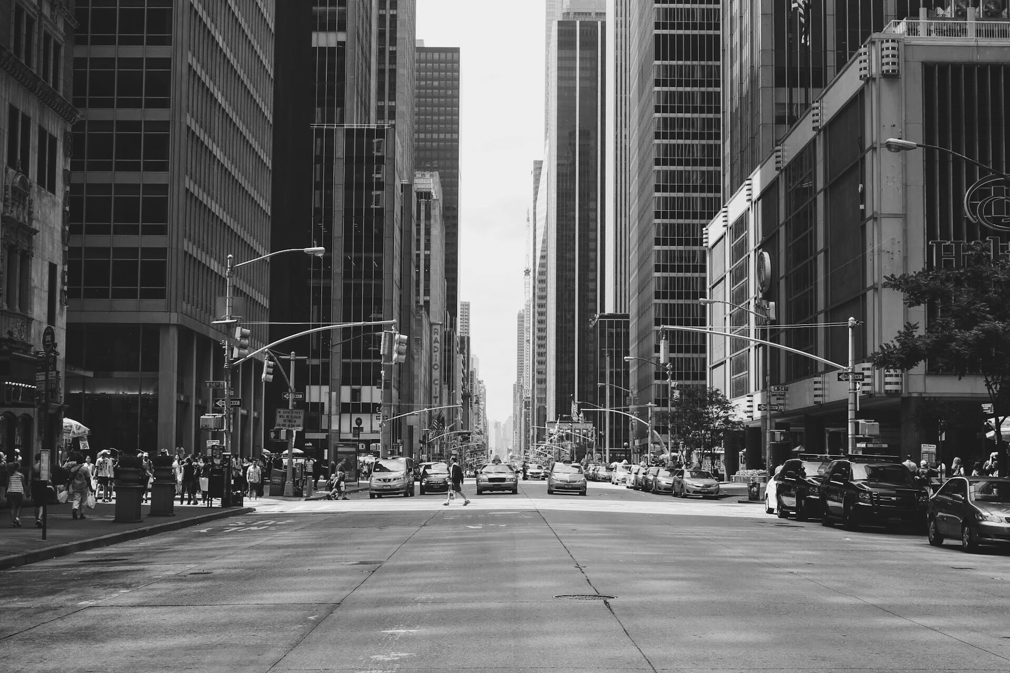 Pedestrians and taxis on Sixth Avenue in Midtown Manhattan, New York